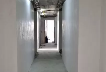 Revestimento paredes hall dos elevadores